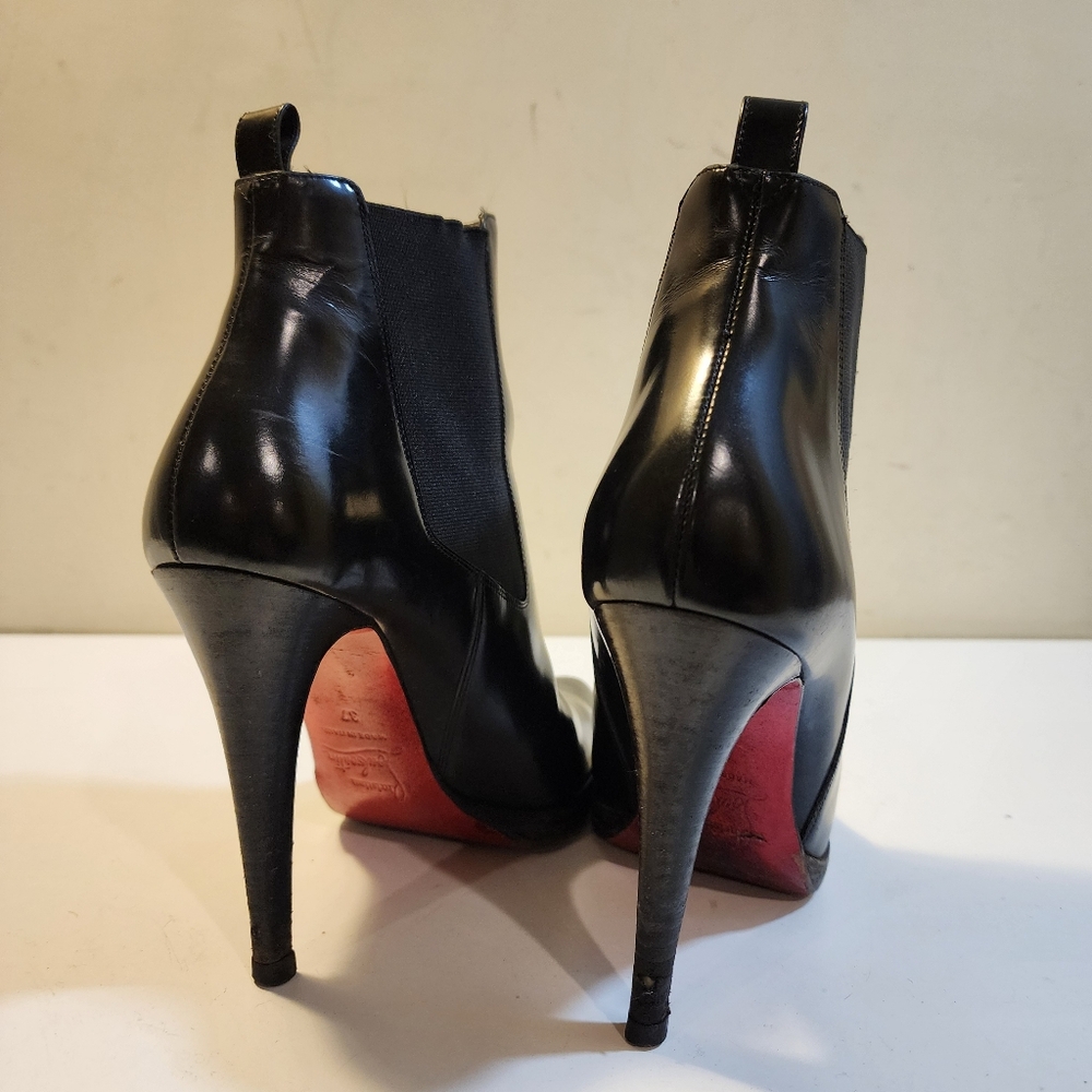Christian Louboutin Black Leather Ankle Booties with Signature Red Soles - Picture 7 of 14